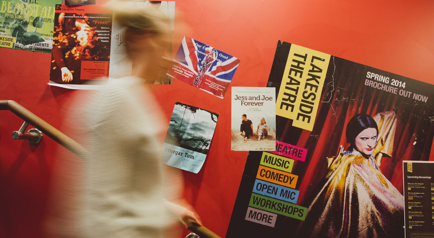 Audience member walking down the stairs